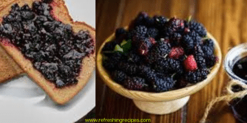 A slice of bread with dark berry jam, possibly made from mulberries, sits next to a bowl filled with fresh blackberries and a small jar of jam on a wooden surface.