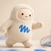 Muse mascot with a whisk in a studio portrait
