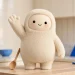 Muse mascot in a studio hero shot with a wooden spoon