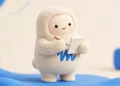 Muse mascot with a blank notepad and pencil
